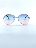 Oversized rimless blue and pink gradient aviators