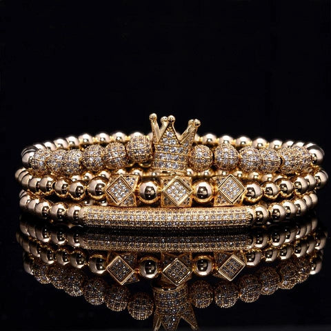 Set of three 14k gold plated king crown bracelets