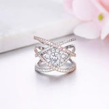 Elegant rose and white gold cross cross ring