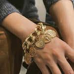 Big chunky gold charm bracelet