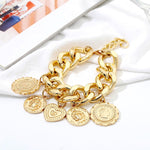 Big chunky gold charm bracelet